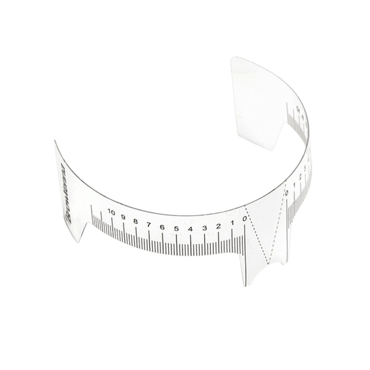 Regla para cejas BrowXenna® con indicador, flexible y transparente, doble escala centrada para simetría profesional en diseño de cejas.